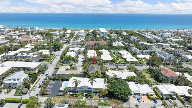 bird's eye view with a water view and a residential view