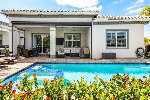 back of house featuring stucco siding, an outdoor living space, a patio area, and a pool with connected hot tub