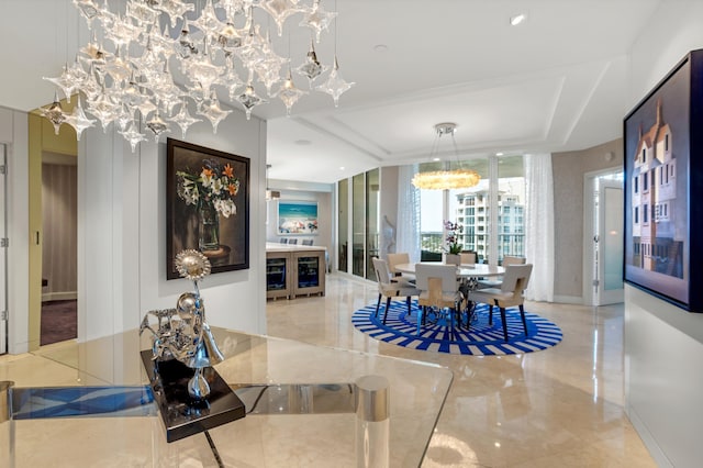 3740 S Ocean Blvd Unit 1205, Highland Beach, FL 33487 - dining space with a raised ceiling and a notable chandelier