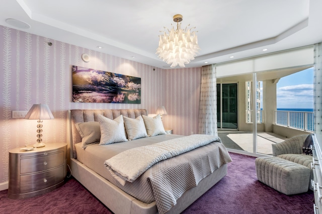 3740 S Ocean Blvd Unit 1205, Highland Beach, FL 33487 - bedroom featuring recessed lighting, a raised ceiling, carpet floors, a chandelier, and access to outside