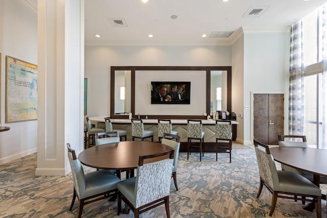 3740 S Ocean Blvd Unit 1205, Highland Beach, FL 33487 - dining room featuring visible vents, baseboards, and ornamental molding