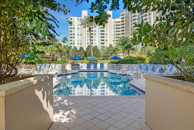 3740 S Ocean Blvd Unit 1205, Highland Beach, FL 33487 - pool with a patio