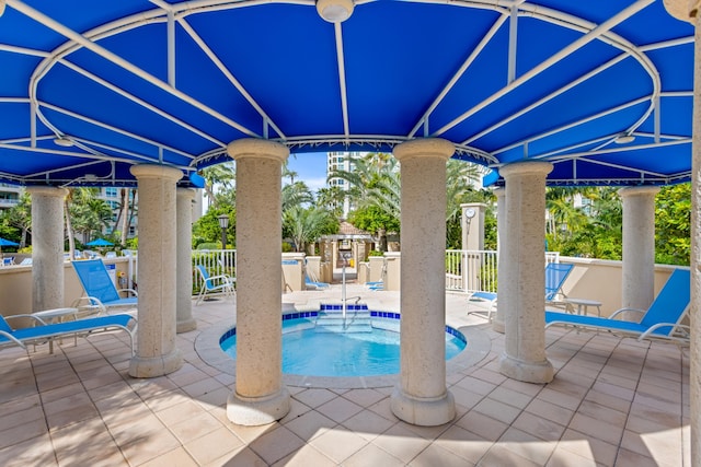 3740 S Ocean Blvd Unit 1205, Highland Beach, FL 33487 - view of swimming pool with fence, a patio area, and a swimming pool