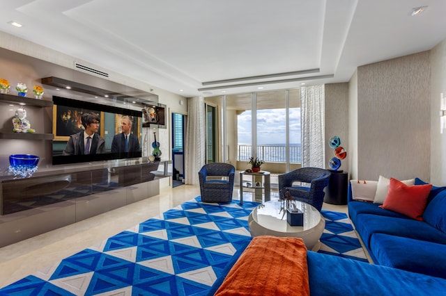 3740 S Ocean Blvd Unit 1205, Highland Beach, FL 33487 - tiled living room with expansive windows, recessed lighting, visible vents, and a raised ceiling