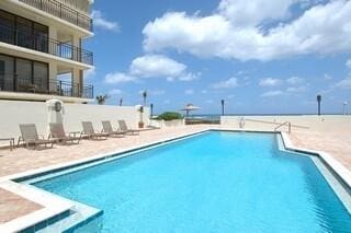 community pool featuring a patio