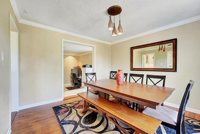 946 Paseo Morella, West Palm Beach, FL 33405 - dining area featuring light wood-style floors, crown molding, baseboards, and an office area