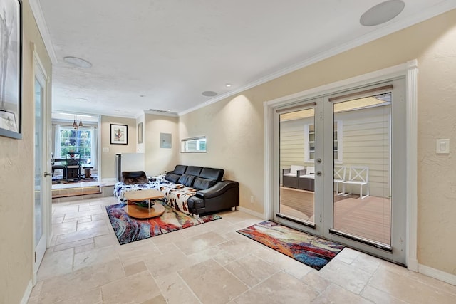 946 Paseo Morella, West Palm Beach, FL 33405 - living room featuring french doors, stone tile floors, ornamental molding, baseboards, and a textured wall