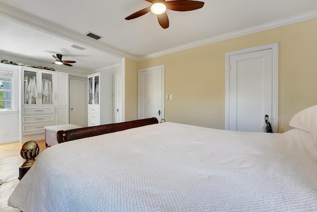 946 Paseo Morella, West Palm Beach, FL 33405 - bedroom featuring crown molding, wood finished floors, and a ceiling fan