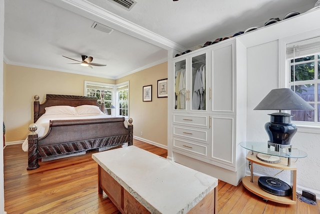 946 Paseo Morella, West Palm Beach, FL 33405 - bedroom with ornamental molding, light wood-style flooring, ceiling fan, and baseboards