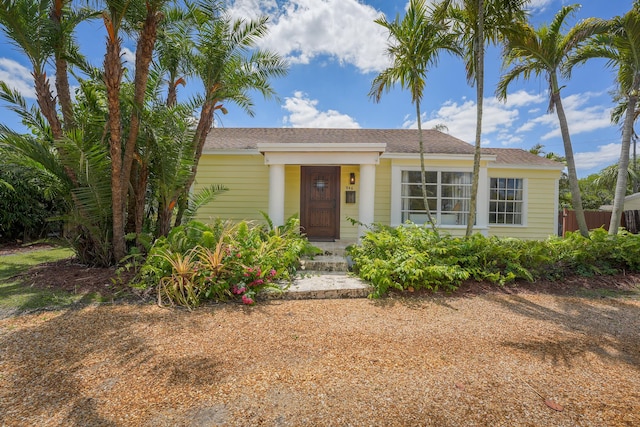 946 Paseo Morella, West Palm Beach, FL 33405 - view of front facade featuring a shingled roof