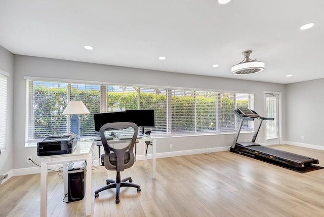 office featuring recessed lighting, baseboards, and wood finished floors