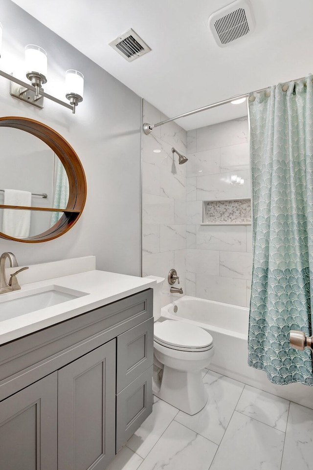 bathroom featuring toilet, visible vents, shower / tub combo, and marble finish floor