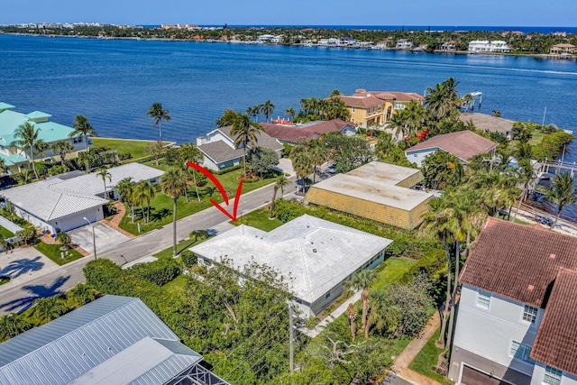 aerial view featuring a water view and a residential view