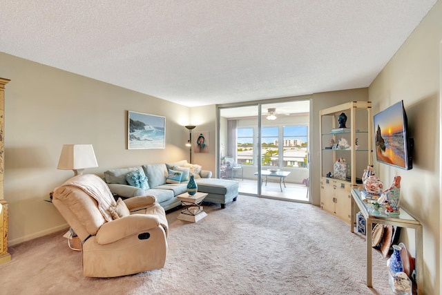 25 Abbey Ln Unit 404, Delray Beach, FL 33446 - carpeted living room with a textured ceiling