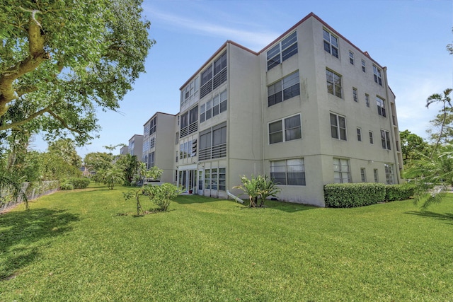 25 Abbey Ln Unit 404, Delray Beach, FL 33446 - view of property with fence