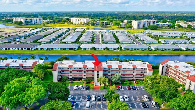 25 Abbey Ln Unit 404, Delray Beach, FL 33446 - aerial view of apartment complex and a large body of water