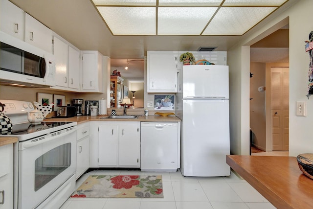 25 Abbey Ln Unit 404, Delray Beach, FL 33446 - office area featuring baseboards and tile patterned floors