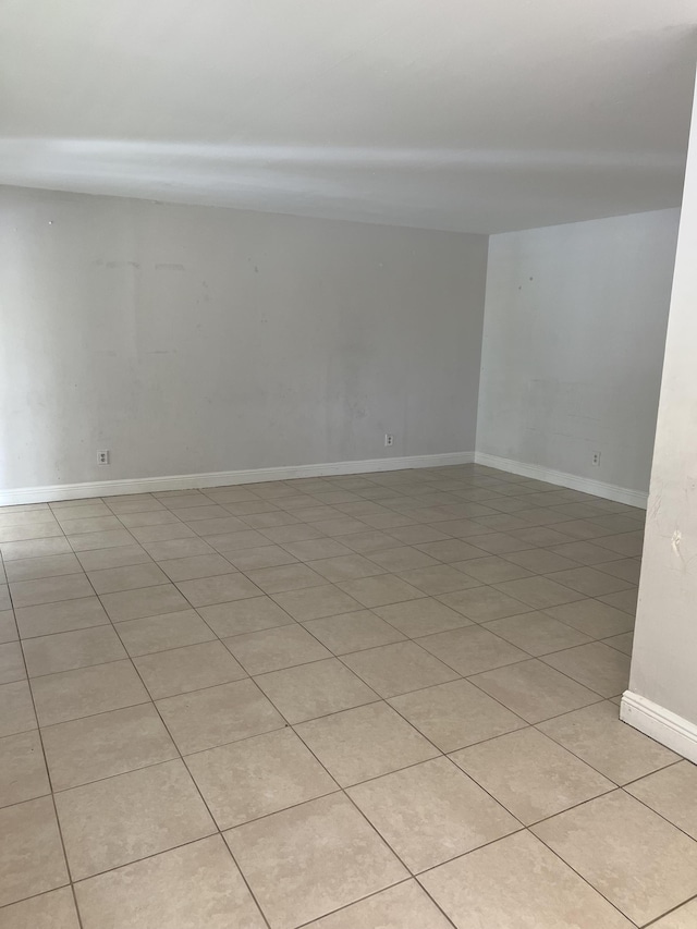 420 Meadows Cir, Boynton Beach, FL 33436 - unfurnished room with light tile patterned floors and baseboards