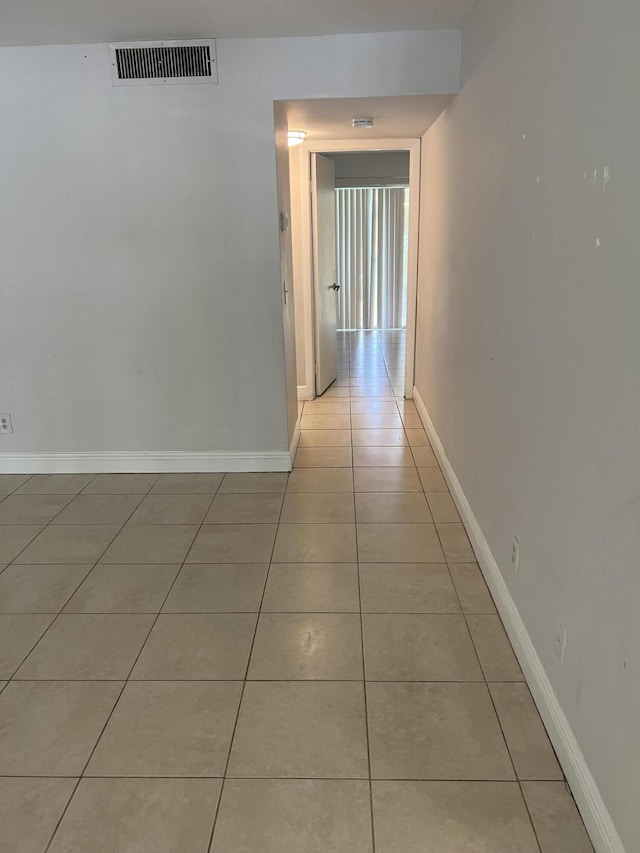 420 Meadows Cir, Boynton Beach, FL 33436 - corridor with light tile patterned floors, visible vents, and baseboards