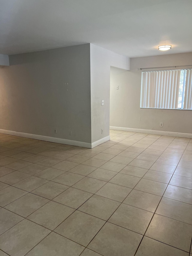 420 Meadows Cir, Boynton Beach, FL 33436 - unfurnished room with light tile patterned floors and baseboards