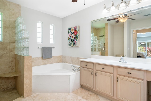 1167 Egret Cir S, Jupiter, FL 33458 - full bathroom featuring ceiling fan, a garden tub, vanity, a walk in shower, and connected bathroom