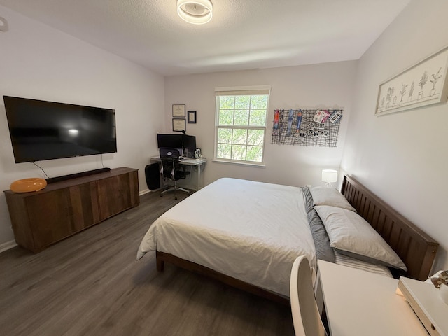275 Murcia Dr Unit 304, Jupiter, FL 33458 - bedroom with wood finished floors, an office area, and baseboards