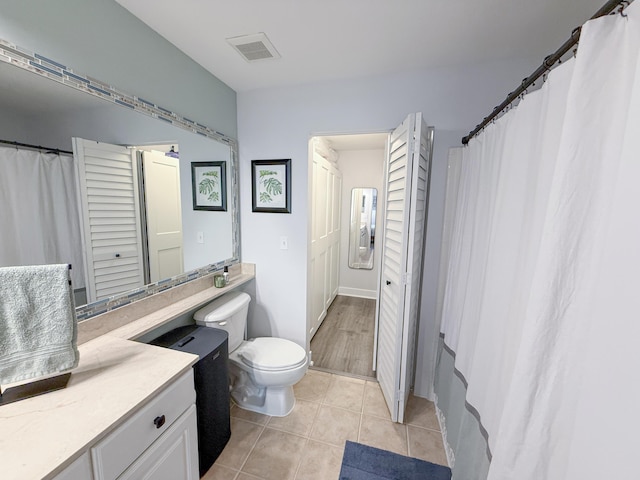 275 Murcia Dr Unit 304, Jupiter, FL 33458 - full bath featuring toilet, vanity, and tile patterned floors