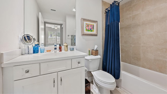 full bath with shower / bath combination with curtain, toilet, a ceiling fan, and vanity