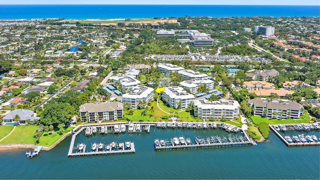 birds eye view of property featuring a water view