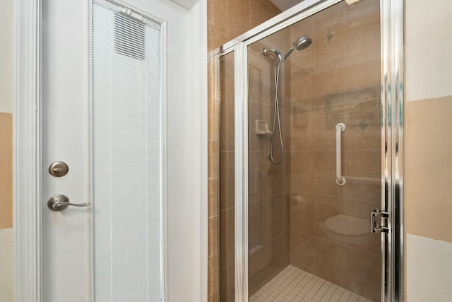 bathroom with a stall shower