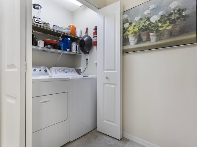 14586 Lucy Dr, Delray Beach, FL 33484 - laundry area featuring separate washer and dryer and laundry area