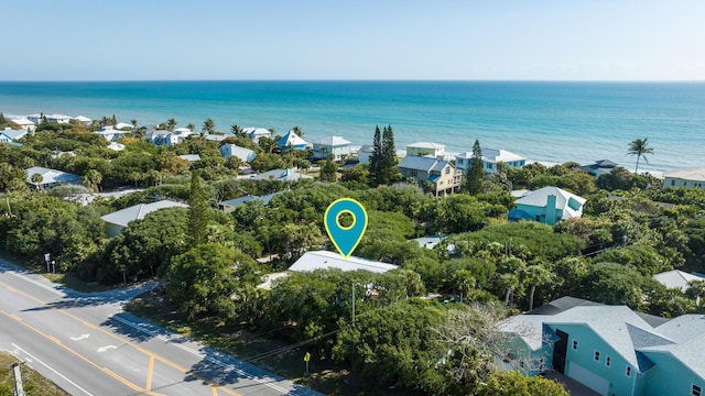 birds eye view of property with a residential view and a water view