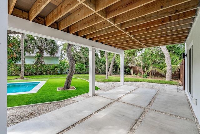 view of patio with an outdoor pool and a fenced backyard