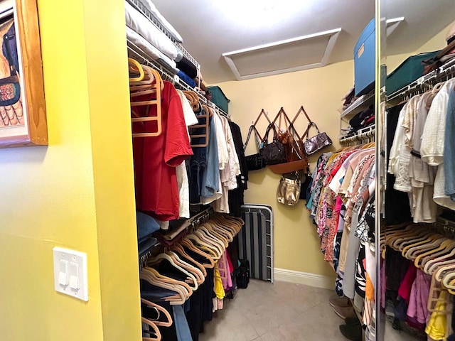 4330 Lucerne Villas Ln, Lake Worth, FL 33467 - walk in closet featuring attic access
