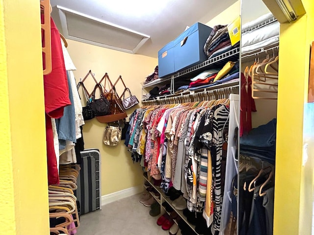 4330 Lucerne Villas Ln, Lake Worth, FL 33467 - walk in closet featuring attic access