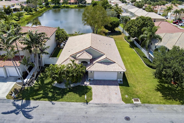 aerial view featuring a residential view and a water view