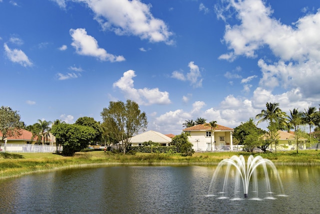 view of water feature featuring fence