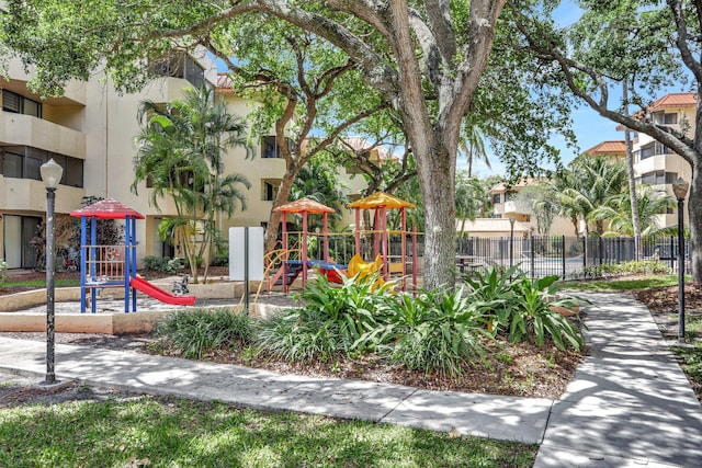 7451 NW 16th St Unit 303, Plantation, FL 33313 - view of community with fence and playground community