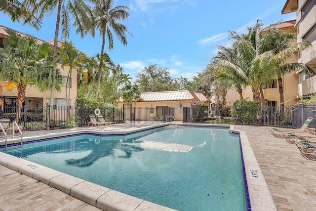 7451 NW 16th St Unit 303, Plantation, FL 33313 - pool with fence and a patio