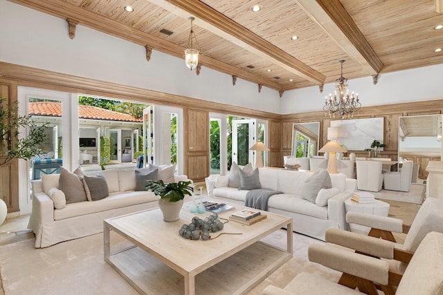 living room featuring recessed lighting, beam ceiling, wood ceiling, and an inviting chandelier