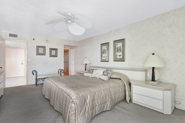 1360 S Ocean Blvd Unit 2508, Pompano Beach, FL 33062 - bedroom with light colored carpet, ceiling fan, and a textured ceiling