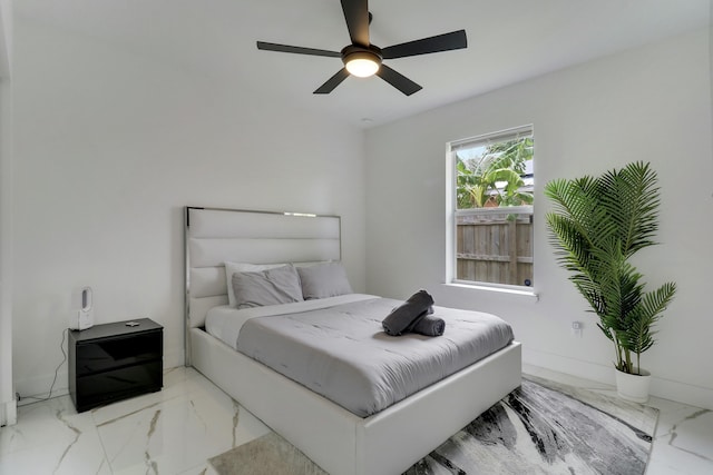 626 33rd St, West Palm Beach, FL 33407 - bedroom featuring marble finish flooring and a ceiling fan