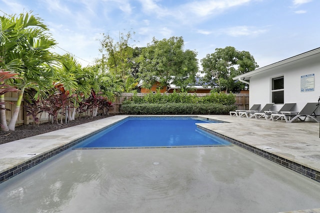 626 33rd St, West Palm Beach, FL 33407 - view of pool with a fenced backyard and a patio area