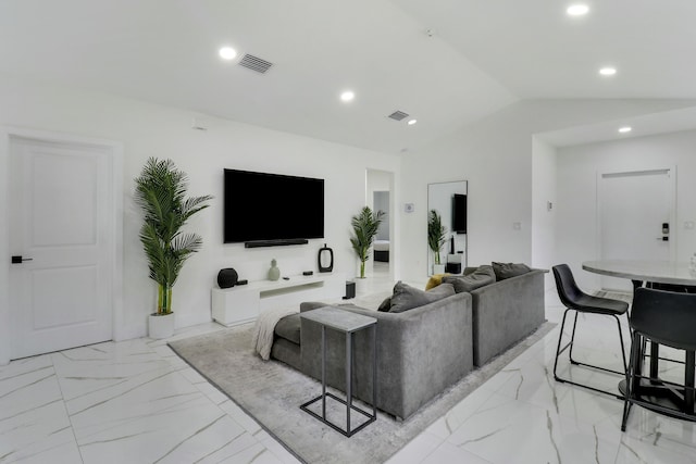 626 33rd St, West Palm Beach, FL 33407 - living room with light marble finish flooring, lofted ceiling, and recessed lighting