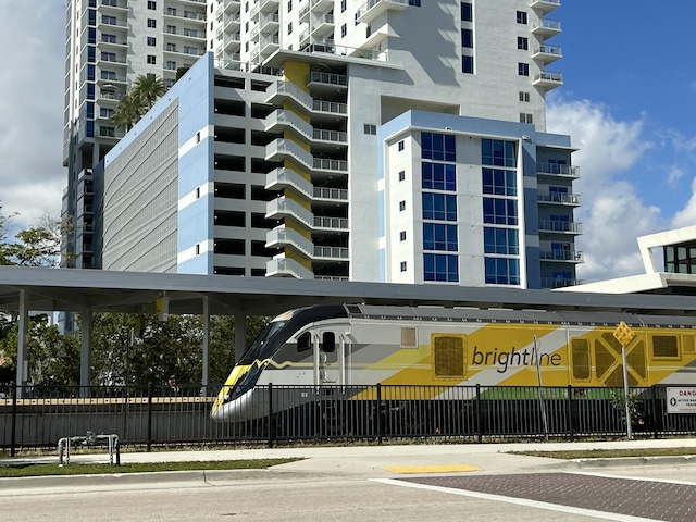 626 33rd St, West Palm Beach, FL 33407 - view of apartment building / complex featuring a parking lot