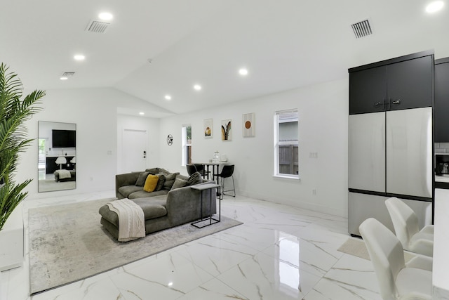 626 33rd St, West Palm Beach, FL 33407 - living room featuring light marble finish floors, recessed lighting, vaulted ceiling, and baseboards