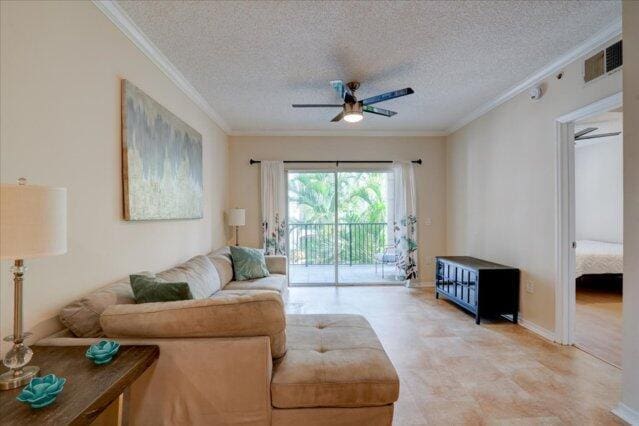 2221 Tuscany Way, Boynton Beach, FL 33435 - kitchen with a peninsula, a textured ceiling, electric range, white cabinetry, and black microwave