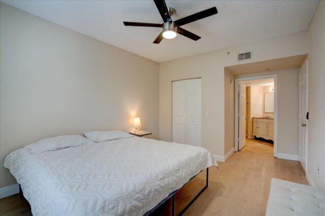 2221 Tuscany Way, Boynton Beach, FL 33435 - bathroom featuring a shower stall, visible vents, and a sink