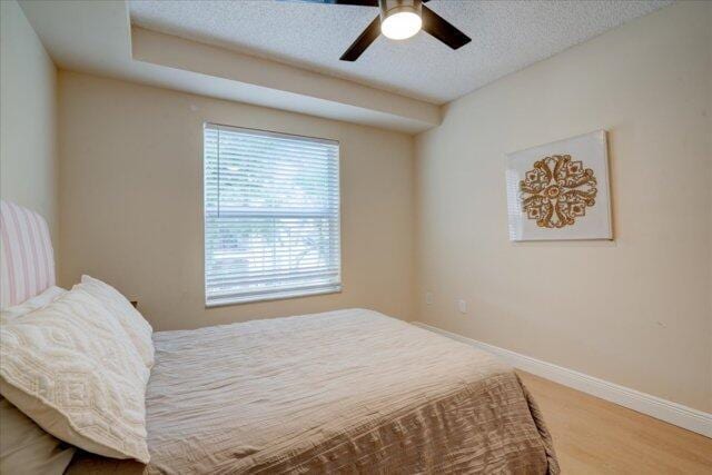 2221 Tuscany Way, Boynton Beach, FL 33435 - bedroom featuring a closet, baseboards, ceiling fan, and visible vents