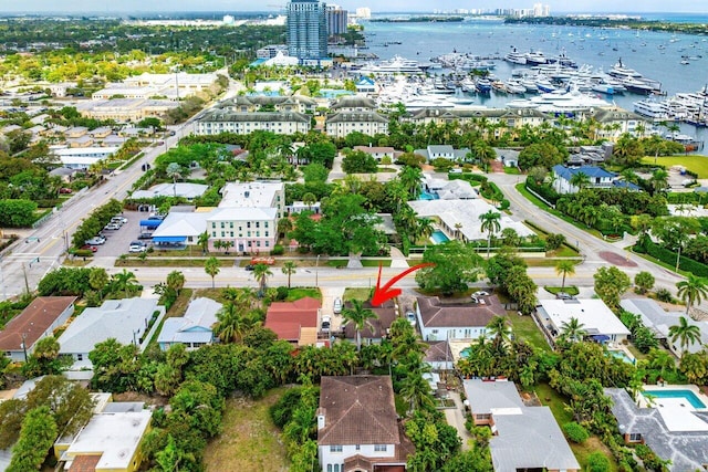 drone / aerial view with a water view and a city view